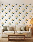 Buttercup Meadow yellow floral wallpaper in a warm and inviting living room