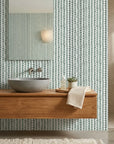 Cactus Lane serene green abstract wallpaper creating ambiance in a serene bathroom