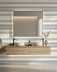 Calm Weave navy blue diagonal stripe wallpaper creating ambiance in a serene bathroom