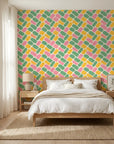 Candy Cobbles colorful retro geometric brick wallpaper adding character to a cozy bedroom