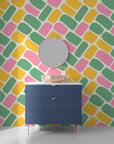 Modern geometric peel and stick wallpaper showcasing a spectrum of vivid pill-shaped tiles - Candy Cobbles