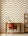 Caramel Drip taupe & gold geometric wallpaper as a feature wall in a bright home office