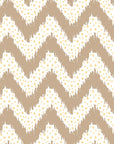 Caramel Drip taupe & gold geometric wallpaper creating ambiance in a serene bathroom