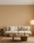 Caramel Haze cozy caramel brushstroke dot wallpaper in a warm and inviting living room