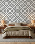 Carbon Bloom grey floral peel and stick wallpaper adding character to a cozy bedroom