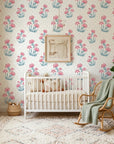Carnation Lattice pink and blue floral wallpaper in a warm and inviting living room