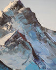 Carved in Ice blue mountain impasto landscape wallpaper creating ambiance in a serene bathroom