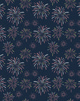A deep navy wall covering patterned with yellow and pink firework explosions - Celestial Burst