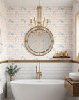 Celestial Prance pink and gold unicorn wallpaper creating ambiance in a serene bathroom