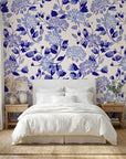 Cerulean Cascade classic blue and white chinoiserie floral wallpaper adding character to a cozy bedroom