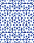 Self-adhesive wallpaper featuring a blue and white Moroccan star tile pattern, Cerulean Echoes