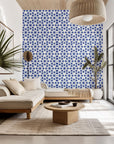 Self-adhesive wallpaper featuring a blue and white Moroccan geometric star tile design, named Cerulean Echoes