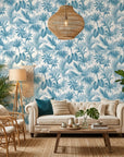 Cerulean Eden lush blue jungle wallpaper in a warm and inviting living room