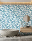 Cerulean Eden lush blue jungle wallpaper creating ambiance in a serene bathroom
