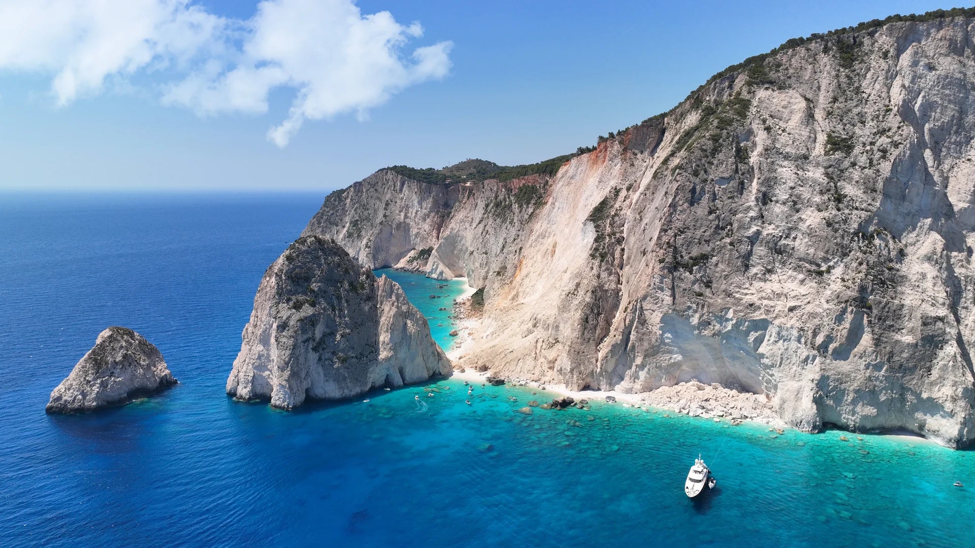 Soft textured palette with pop of turquoise on removable wallpaper