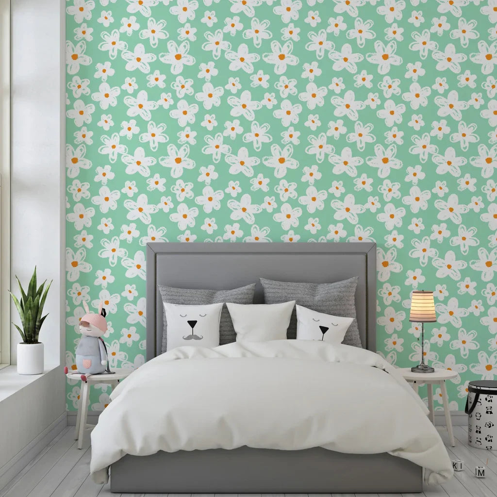 Self-adhesive wallpaper featuring white crayon-style daisies over a soft mint green backdrop. - Chalky Meadow