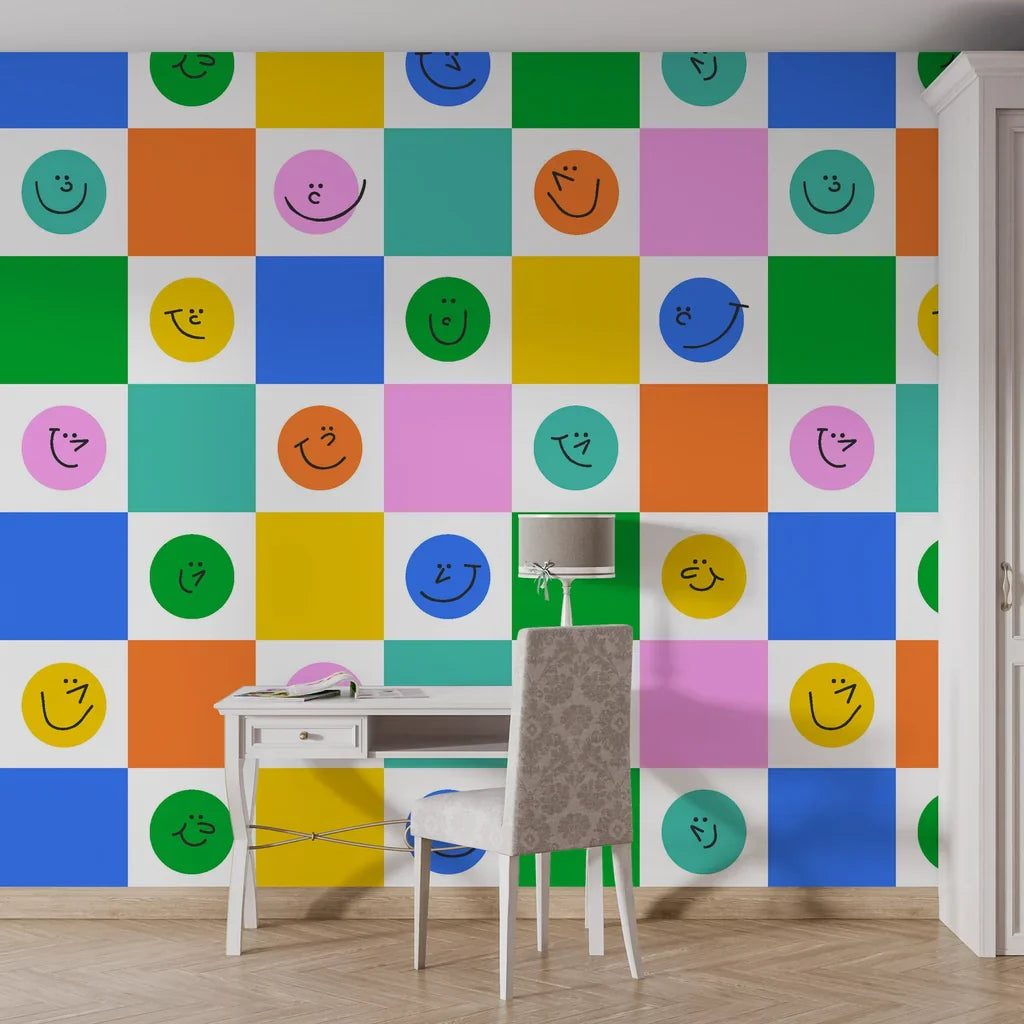 Vibrant checkered self-adhesive wall covering adorned with cheerful grinning icons in a non-reflective finish. - Cheery Checks