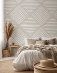 Textured wall featuring a geometric, manually sketched chevron design creating a visual rhythm.