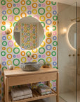 Chromatic Echoes retro colorful geometric wallpaper creating ambiance in a serene bathroom