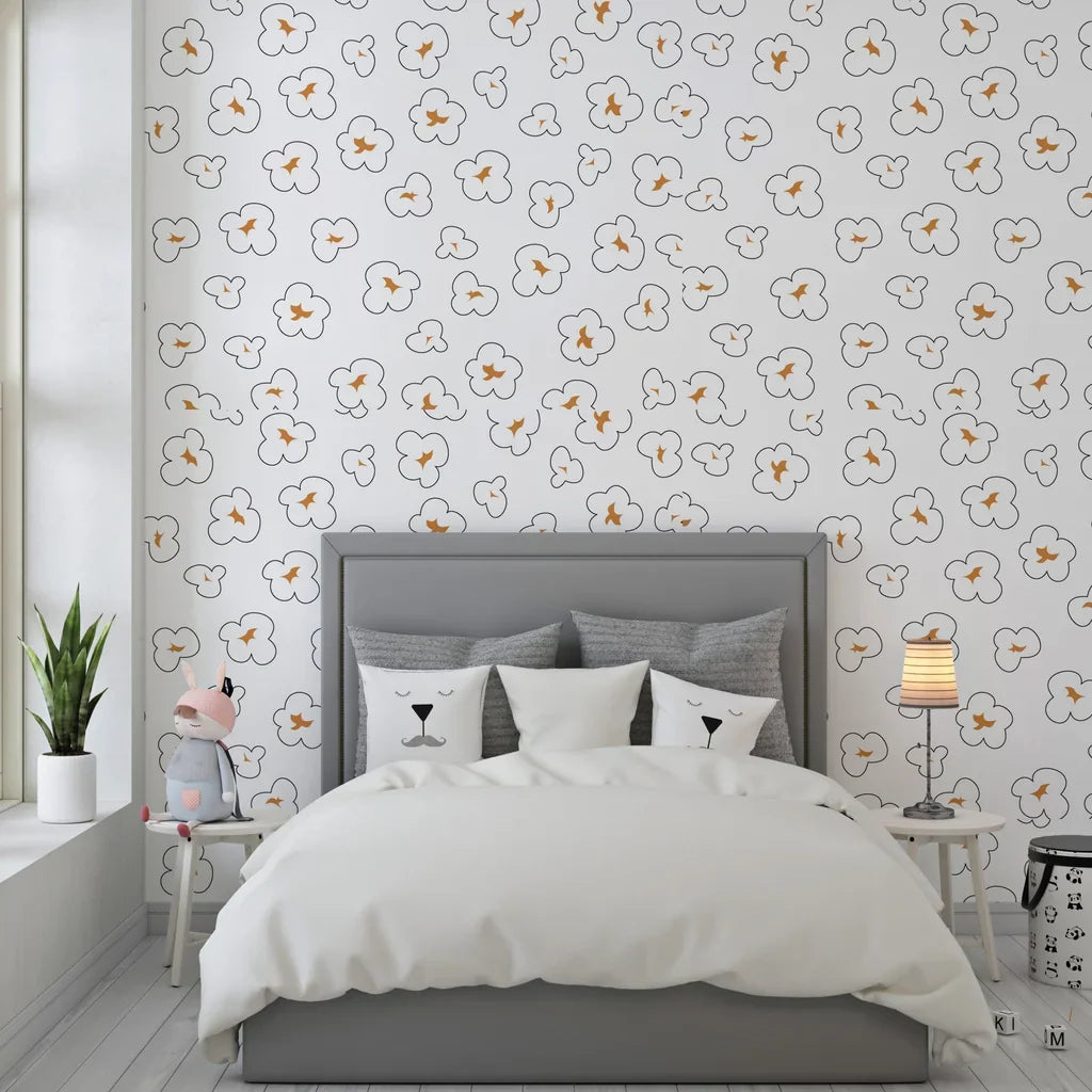 Self-adhesive wallpaper featuring a playful motif of white and golden-brown popcorn kernels - Cinema Swirl