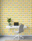 Citrus Bloom yellow lemon and green geometric tile wallpaper as a feature wall in a bright home office