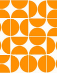 Self-adhesive wallpaper featuring a mid-century modern, orange half-circle geometric design (Citrus Grid)