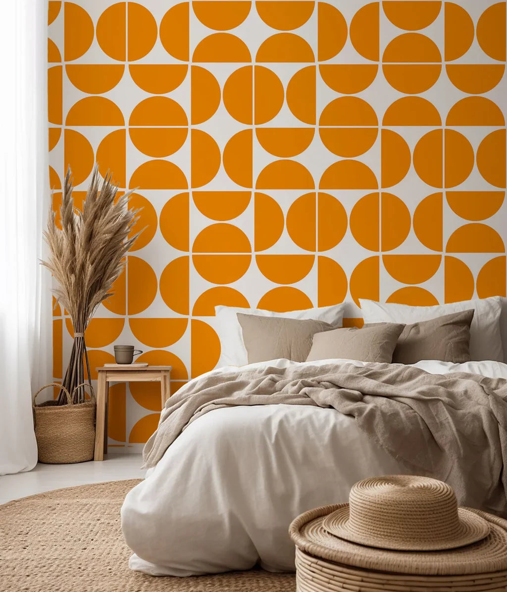 Self-adhesive wallpaper featuring an orange, mid-century geometric half-circle pattern, known as Citrus Grid.
