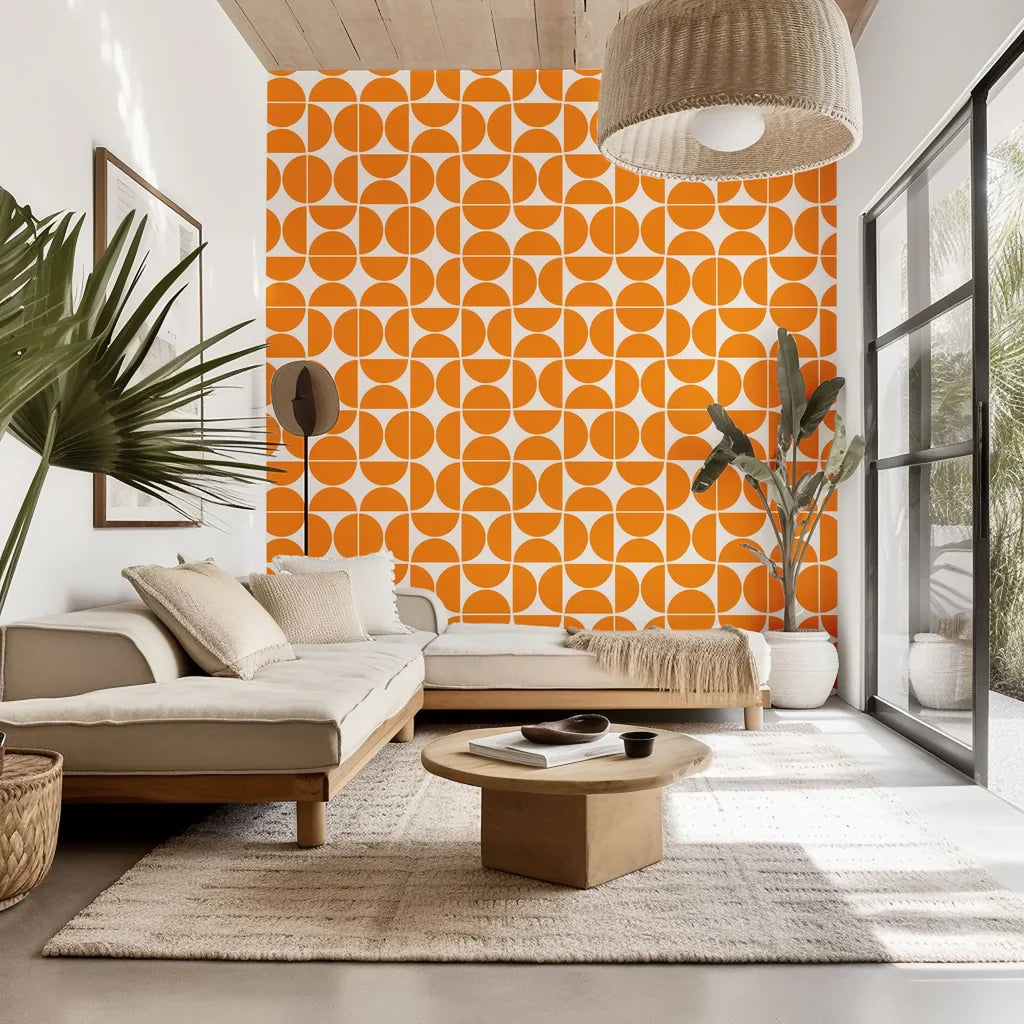 Self-adhesive wallpaper featuring an orange, mid-century geometric pattern of semicircles, known as the Citrus Grid design