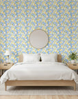 Citrus Splash playful blue floral wallpaper adding character to a cozy bedroom