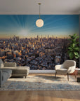City Ablaze mural wallpaper featuring New York skyline at golden hour on modern living room accent wall