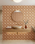Clay Burst rustic orange floral wallpaper creating ambiance in a serene bathroom