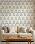 Clipped Dreams blue botanical tree wallpaper in a warm and inviting living room