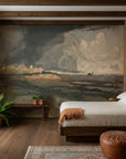 Cloud Sanctuary mural wallpaper featuring vintage stormy seascape on rustic bedroom accent wall