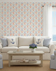 Coastal Feast coral seafood damask wallpaper in a warm and inviting living room