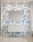 Cobalt Bloom bold blue chinoiserie floral wallpaper creating ambiance in a serene bathroom