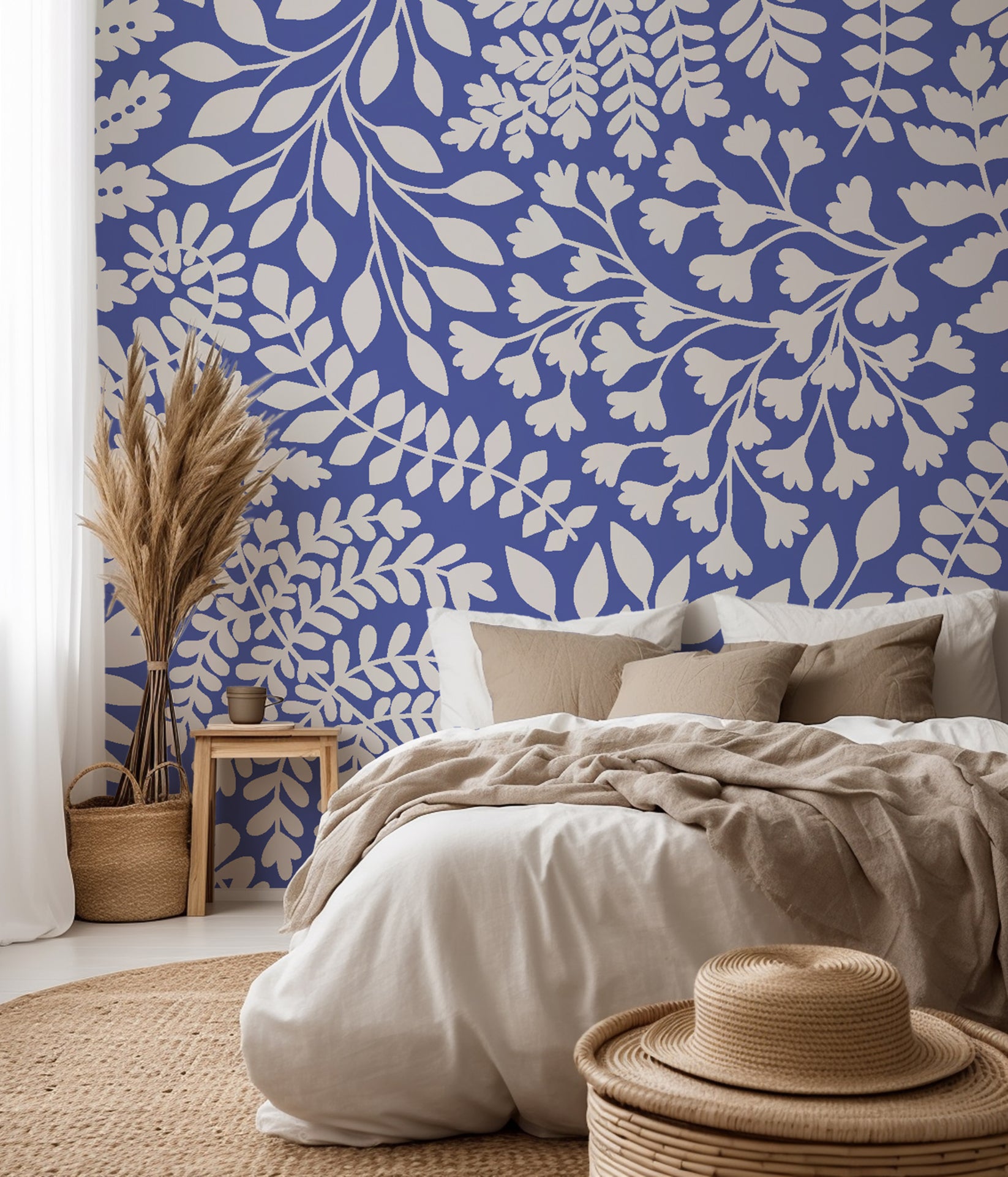 Moody deep blue leaf silhouettes create a lush and immersive forest canopy wall.