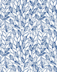 Cobalt Leaf blue botanical peel and stick wallpaper creating ambiance in a serene bathroom