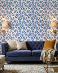 Cobalt Meadow blue floral peel and stick wallpaper in a warm and inviting living room