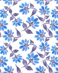 Cobalt Meadow blue floral peel and stick wallpaper creating ambiance in a serene bathroom