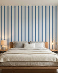 Cobalt Stripe blue and white striped wallpaper in a warm and inviting living room