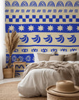 Boho-style hand-drawn stripes in blue and cream on a self-adhesive wallpaper