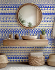 Bohemian-style peel and stick wallpaper featuring blue and cream hand-drawn stripes