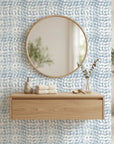 Concrete Drift blue & grey abstract wallpaper creating ambiance in a serene bathroom