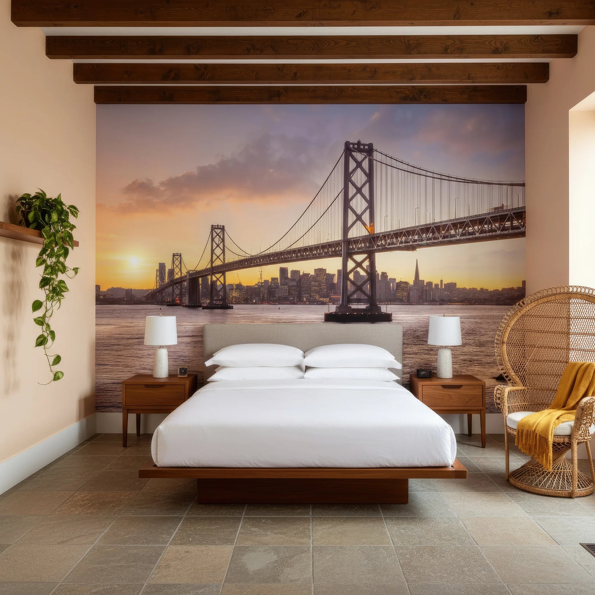 San Francisco Bay Bridge at sunset mural wallpaper behind mid-century modern bedroom with wooden beams