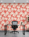 Coral Bloom pink floral wallpaper as a feature wall in a bright home office
