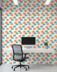 Coral Cove playful coral and blue wallpaper as a feature wall in a bright home office