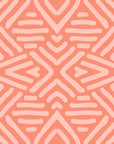 Coral geometric wallpaper with hand-drawn line patterns forming a soft, symmetrical abstract design.
