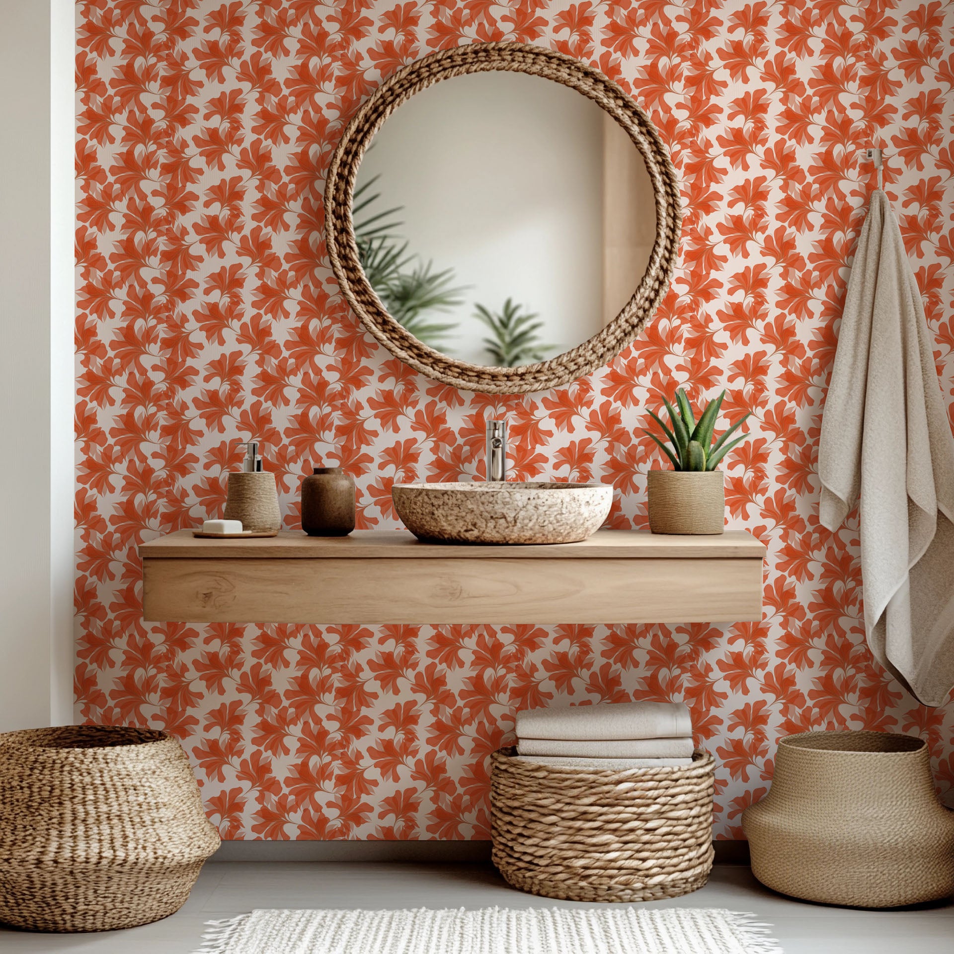 Transparent orange and coral leaves create the pattern on this abstract floral wallpaper, named Coral Whispers