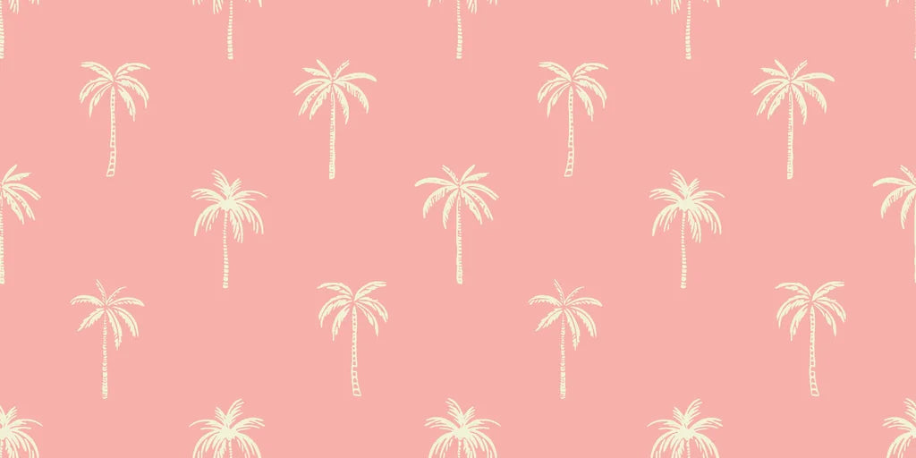 Minimalist palm tree wallpaper in shades of pink and cream with a peel and stick backing