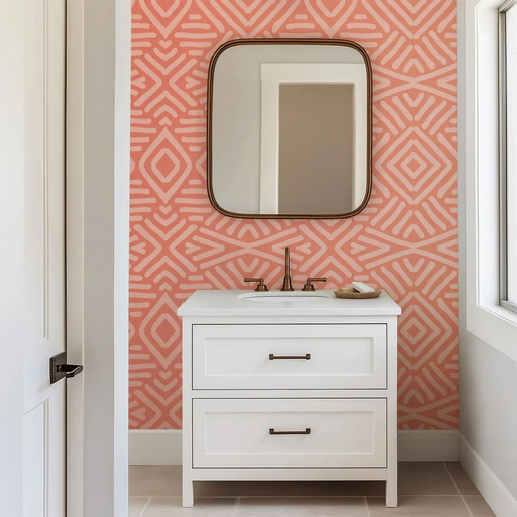 Softly rendered, symmetrical coral wall covering composed of hand-drawn geometric lines creating an abstract pattern